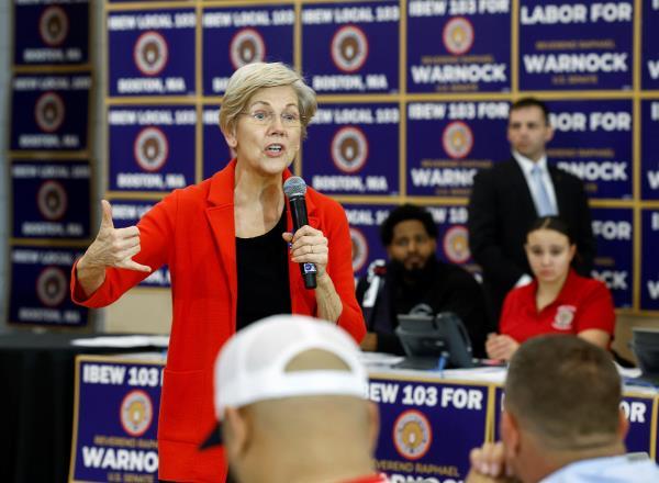U.S. President Biden takes part in an International Brotherhood of Electrical Workers phone bank in Boston