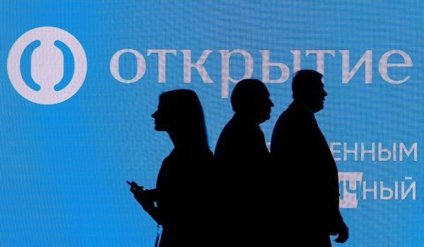 The logo of Russian bank Otkritie is seen on a board