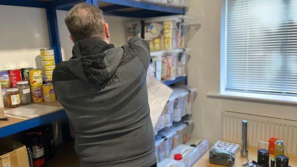 Barry stock checks his supply store