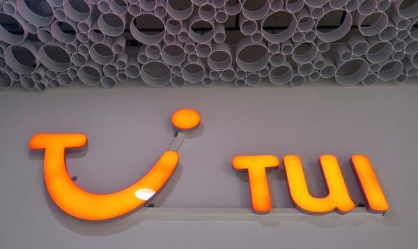 The logo of German travel company TUI AG is seen outside one of its branch offices in Vienna