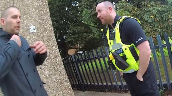 Police arresting Damien Bendall