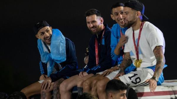 Captain Lionel Messi sitting with Angel de Maria and Nicolas Otamendi ontop of the bus. Pic: AP
