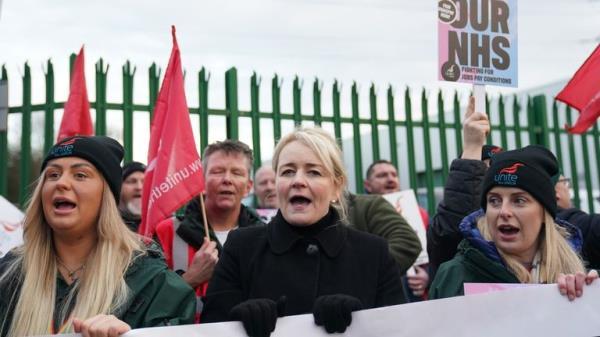Unite union general secretary Sharon Graham (centre), joins ambulance workers on the picket line outside ambulance headquarters in Coventry