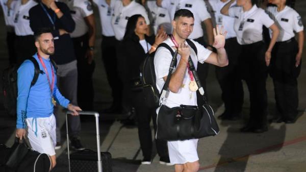 Goalkeeper Emiliano Martinez waves upon arrival. Pic: AP